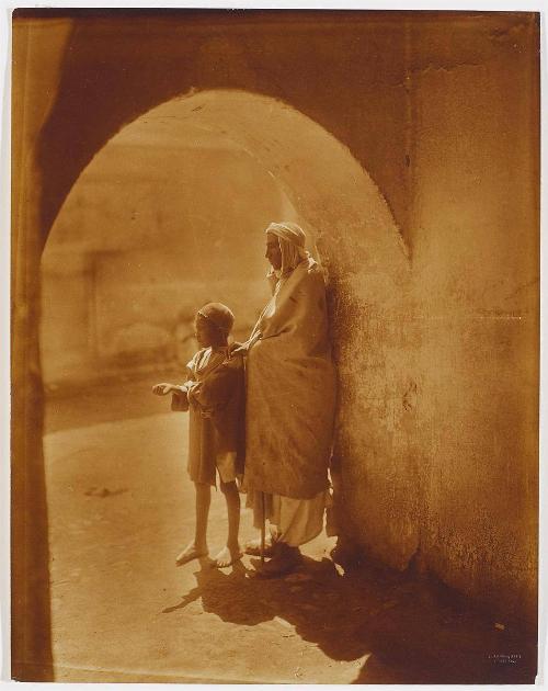 Algeria - Boy and man under an Arch