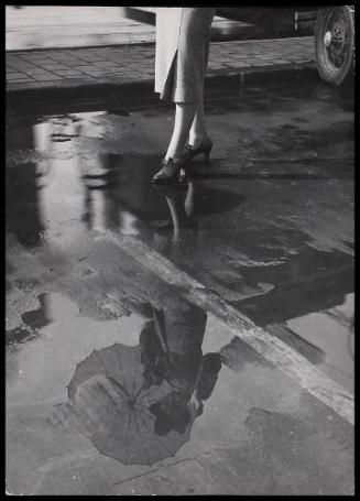 Modelling wet weather wear, reflection in puddle.