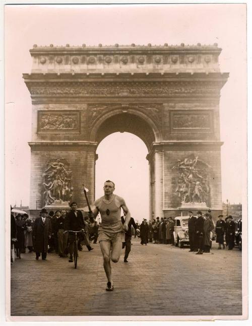 Runners Carry Symbolic Memorial Flame to Ends of France.