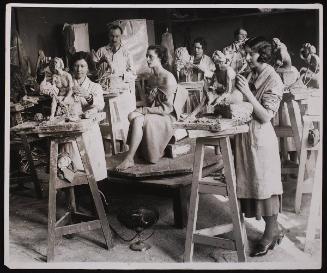 "Reproducing Beauty". A clever study indeed, portraying intensive concentration by pupils of the LCC.