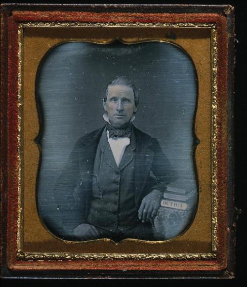 Portrait of a Man (with bow tie and books)