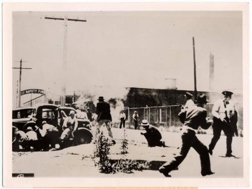 Drawn Guns and Battle-Smoke Typify U.S. Strike Strife.