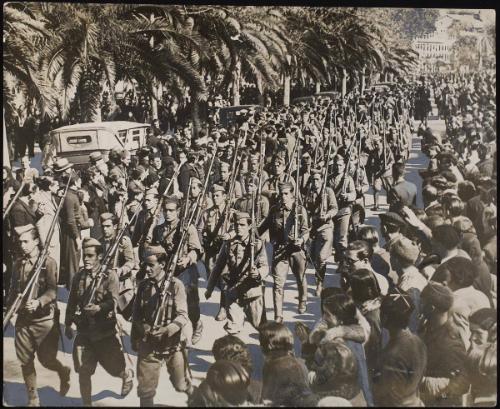 Anto-Red troops pouring into Malaga after Franco's army had liberated the city from its reign of red terror.