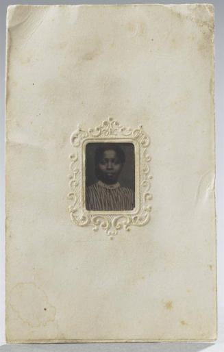 Portrait of African-American woman in striped blouse