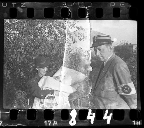 Jewish policeman with mother and child