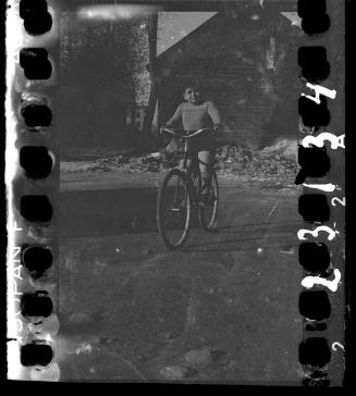 Portrait of a boy on a bike