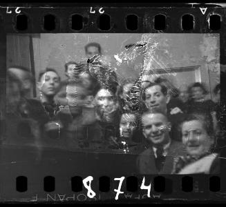 Residents at a social gathering in the ghetto