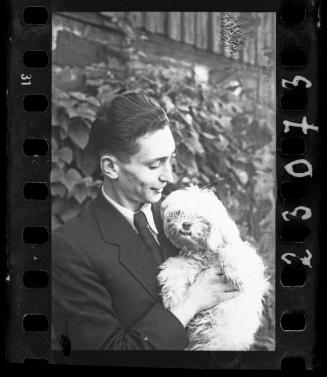 Portrait of a man with a dog