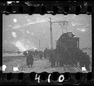 Members of the Transport Department and Jewissh police officers posing in front of a tram delivering cabbage to the ghetto