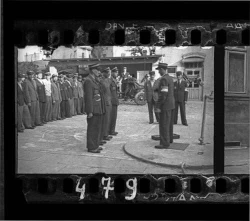 Jewish policemen standing at attention