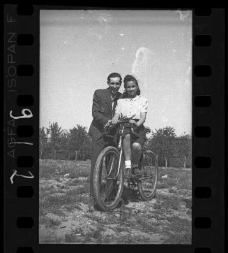 Man with a girl on a bike