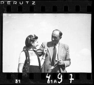 Father and a daughter posing