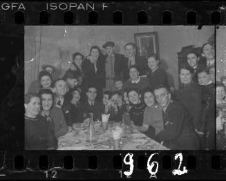 Residents gathered around the table at a dinner party
