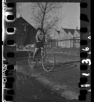 Portrait of a boy on a bike