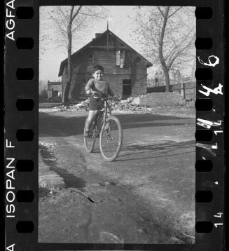Portrait of a boy on a bike