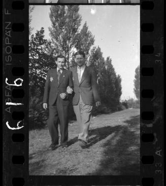 Two ghetto male residents walking