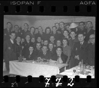 Group portrait of residents at a reception in the ghetto