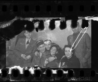 Jewish policeman celebrating with friends
