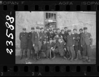 A group of Jewish police outside a food distribution station in Marysin