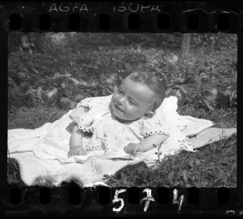 Baby on a blanket outside