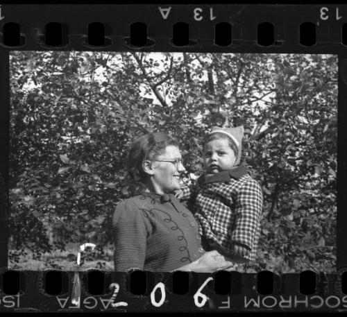 A woman with a young child