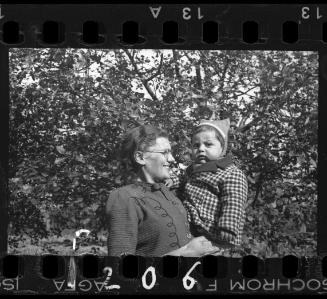 A woman with a young child