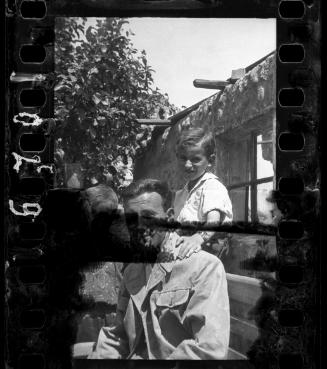 Portrait of a man with a boy