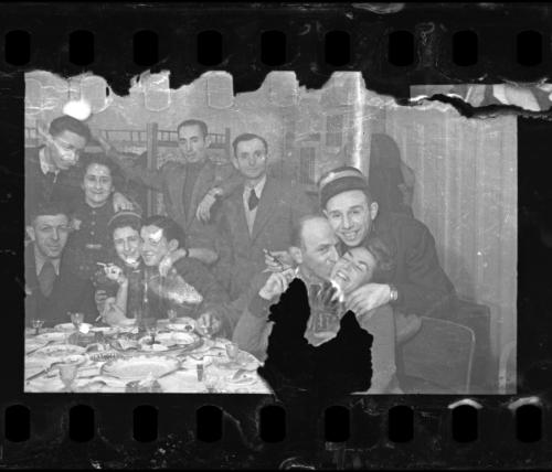 Jewish policeman celebrating with friends