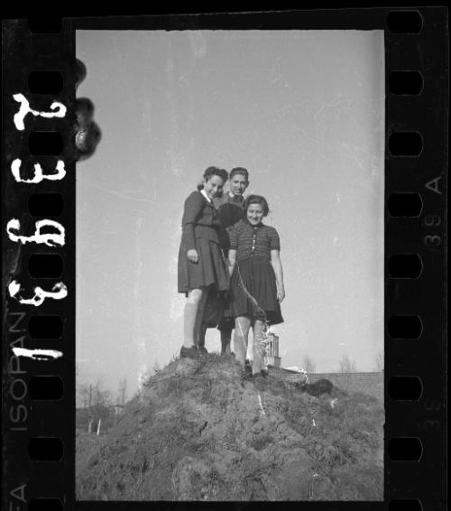 Three young girls in uniforms