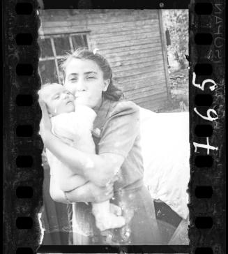 Ghetto policeman's family; mother and child