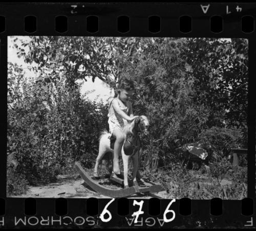 A child on a rocking horse