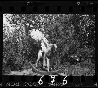 A child on a rocking horse