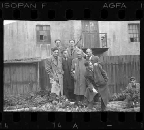 Members of the ghetto administration standing in front of building #9 in the ghetto