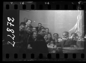 View of residents looking at the camera at a social gathering