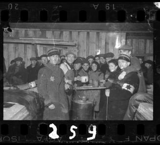 Jewish police oversee soup rations for residents