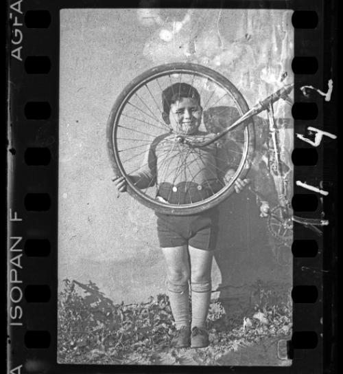 Portrait of a boy with a bike