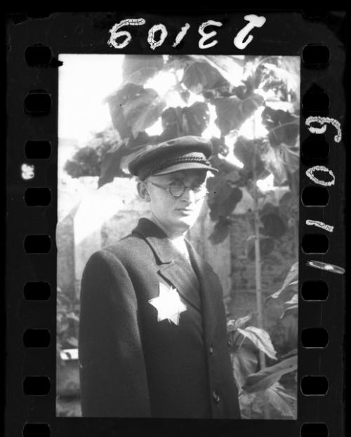 Male ghetto resident in glasses