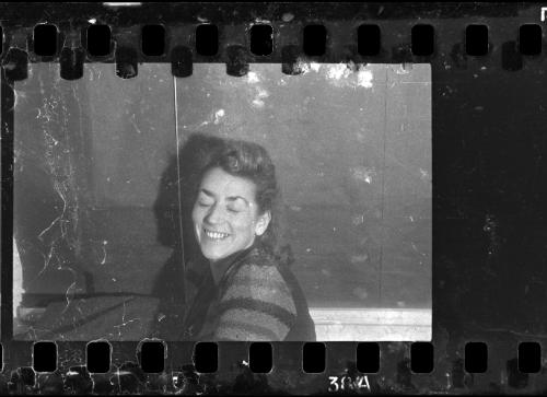 Portrait of Stefania Schoenberg smiling with eyes closed