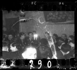 Residents at a wedding reception in the ghetto