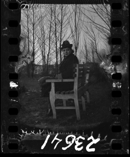 Woman seated on a bench