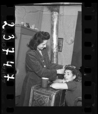Stefania Schoenberg and her friend, Inka Z. at home
