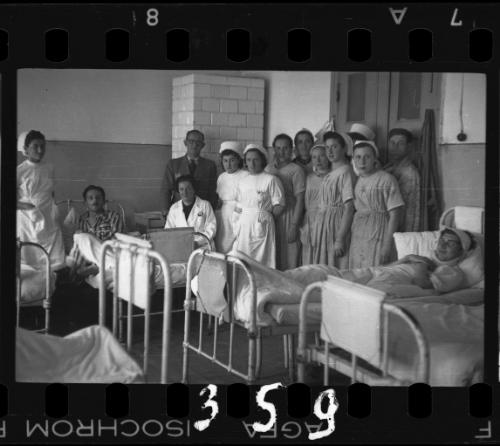 Group portrait of nurses and patients with Dr. Kagan