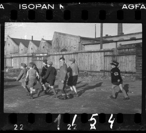 Children playing as ghetto policemen