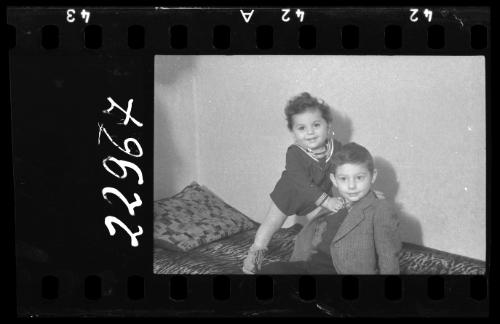 Portrait of a boy with a baby