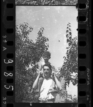 Father with a boy on his shoulders