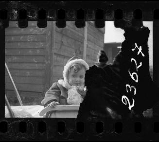 Young child in baby carriage