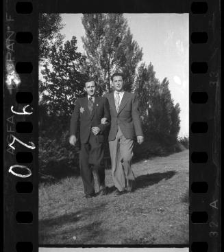 Two ghetto male residents walking