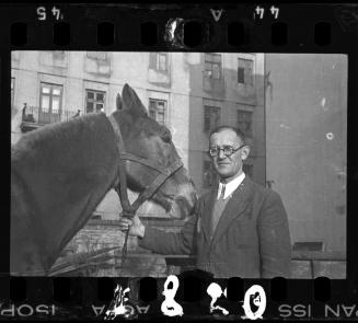Dr. Kagan, administrator of the hospital, and a horse