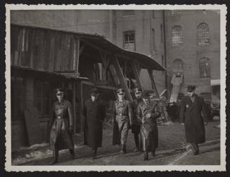 German inspectors of production and factories with director Winograd