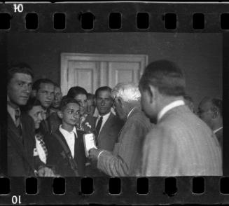 Mordechai Chaim Rumkowski, Elder of the Jews, surrounded by members of the ghetto administration